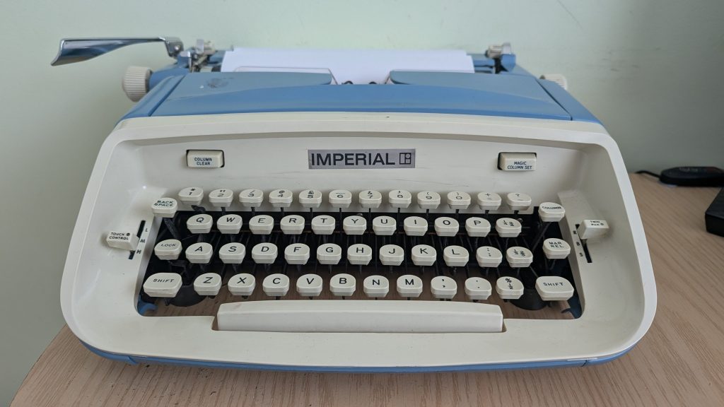 Image of a blue typewriter